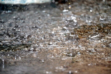Dripping water on surface in the rain