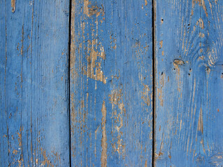 Fototapeta na wymiar old wooden fence with peeling paint