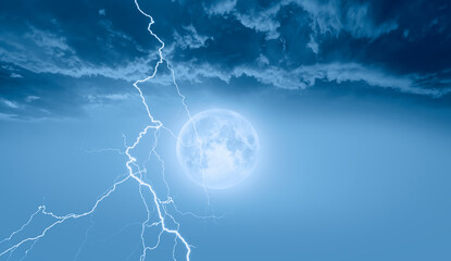 Lightning strikes between blue stormy clouds with full moon  "Elements of this image furnished by NASA"   