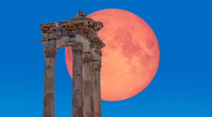 Columns of the ancient city of Pergamon with full moon - Bergama - Turkey "Elements of this image furnished by NASA "