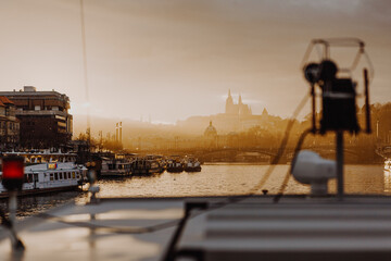 Naklejka premium Cityscape of Prague, Czech Republic from the upper deck of the cruise ship