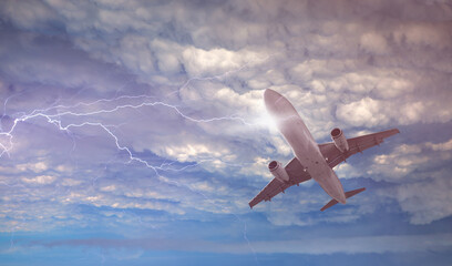 Fototapeta premium Airplane in the sky with thunder and lightning