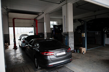 Car repair and maintenance theme. Cars in auto service.