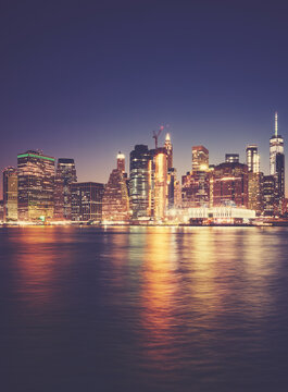 Manhattan waterfront at night, color toned picture, New York City, USA.