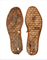 Old insoles for shoes on a white background.