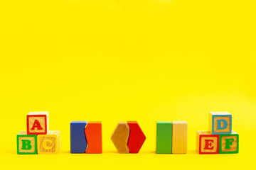 Fototapeta na wymiar Set of colorful wooden shape toy Montessori sensorial material