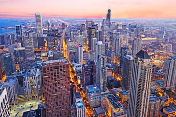 Aerial view of downtown Chicago illuminated at sunset