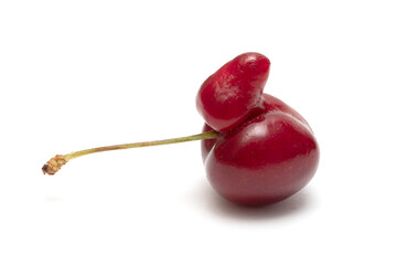 Ripe sweet cherry isolated on a white background, closeup.
