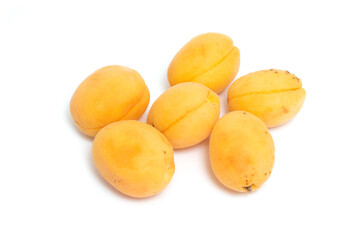 Fototapeta na wymiar Ripe apricots isolated on a white background.