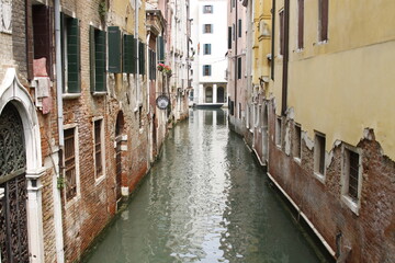 View of a traditional Venice street with colorful shattered windows