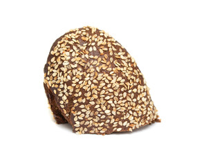 Loaf of black bread with sesame seeds isolated on white background.