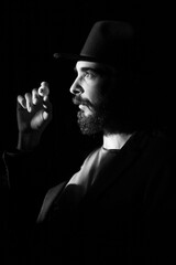 Portrait of a man in a hat and with a mock eye