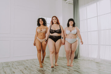 Plus size women posing for body acceptance