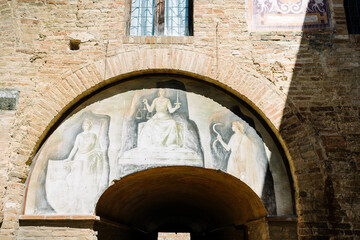 Frescoes in the walls of the town hall of San Gimignano.