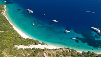 Aerial drone photo of beautiful paradise turquoise sea sandy beach and bay of Gidaki accessible by short hiking in beautiful Ionian island of Ithaki or Ithaca, Greece