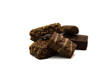 Chocolate candies with nougat bird's milk and crushed hazelnuts