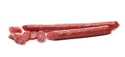 Fermented, smoked sausages with chopped slices isolated on white background