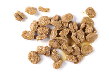 Dog food with meat and vegetable chunks isolated on white background, top view