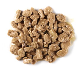 Dog food with meat and vegetable chunks isolated on white background, top view