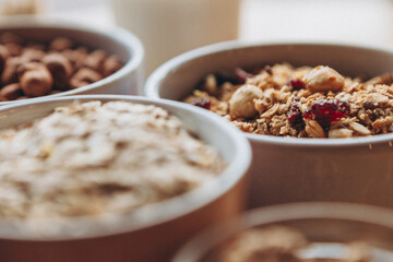 homemade granola for breakfast and the ingredients from which it is prepared, top view