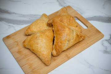 The samosa. Traditional Oriental dish with meat.