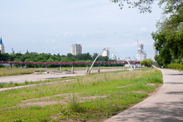 China, Heihe, July 2019: Bridge in the Park on the embankment in Heihe city in summer