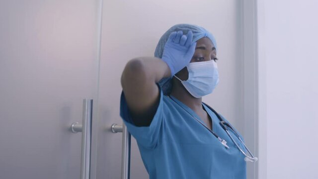 Upset female doctor overworked during pandemic, lack of medical personnel stress