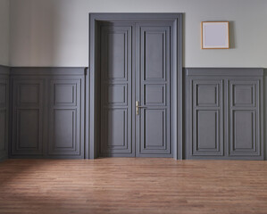 Grey classic door and wall concept, frame vase of plant and brown parquet floor.