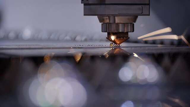 Modern Tool in Heavy Industry. Automation of Process Indoors. Automatic Work for Ironwork. Cut Sheet Metal at Workshop. Dangerous Job. High Precision Manufacture of Steel Parts. Closeup Computer cnc