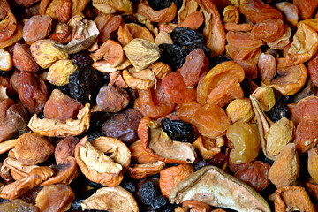 A mixture of dried fruits as a very effective and beautiful background of natural products.