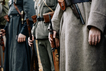 13.10.2019 Vinnitsa, Ukraine: military actors hold weapons of World War II, original guns and...