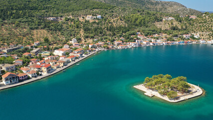 Fototapeta na wymiar Aerial drone panoramic photo of picturesque village capital and port of Ithaki or Ithaca island called Vathi a safe anchoring for sail boats, Ionian, Greece