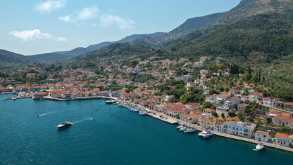 Fototapeta na wymiar Aerial drone panoramic photo of picturesque village capital and port of Ithaki or Ithaca island called Vathi a safe anchoring for sail boats, Ionian, Greece