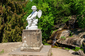 Obraz premium Statue of Cupid in Sofiyivka park in Uman, Ukraine