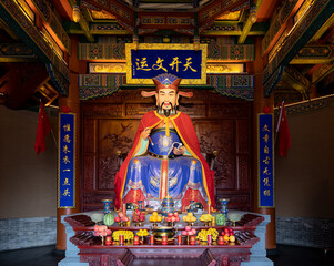 Statue of Zhuyi or Red Robe, God of School Tests and Examination Panic in Taoism,  in Taiping Tower, Datong Old City, Shanxi, China.
