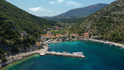 Aerial drone panoramic photo of picturesque village capital and port of Ithaki or Ithaca island called Vathi a safe anchoring for sail boats, Ionian, Greece
