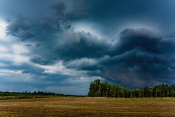 Fototapeta na wymiar Storm clouds over the field