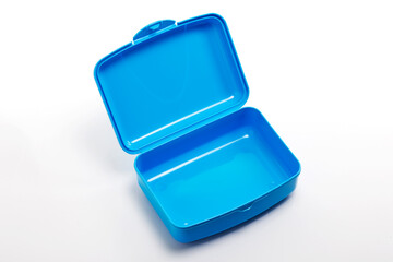 Open plastic lunch box on white background, food container for school