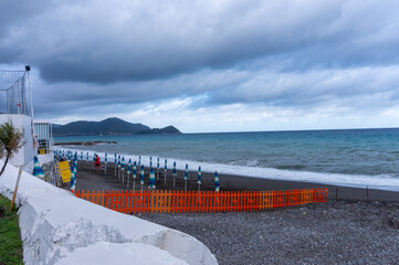 Obraz premium view of the sea and the sky full of clouds, waiting for the storm in Lavagna, Genoa, Italy