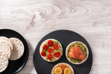 Assortment Puffed rice cake snack on wooden table