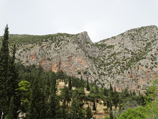 Fototapeta na wymiar Landscape of ancient sanctuary Delphi, also called Python in Greece. The? ancient Greeks?considered the centre of the world is in Delphi, marked by the stone monument known as?the omphalos.