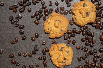 cookie with coffee beans on black