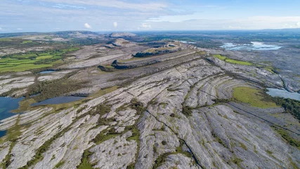 Fotobehang Blauwe hemel scenic rocky landscape of the burren national park in county clare, ireland.  © Gabriel Cassan