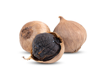 Black garlic bulbs on white background