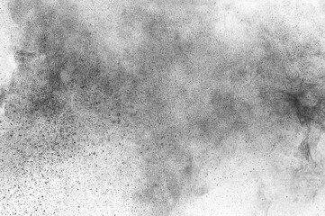 Black particles explosion isolated on white background.  Abstract dust overlay texture.