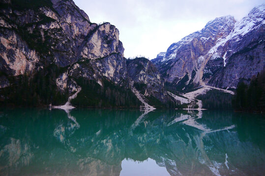 Dolomites rocks and mountain lake.The unique texture of the rocks on the mountain is reflected on the lake. © zhiying