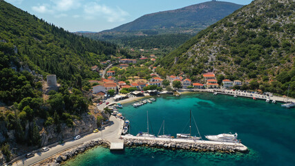 Aerial drone photo of picturesque small fishing village of Frikes a safe anchorage for sail boats and yachts in island of Ithaki or Ithaca, Ionian, Greece