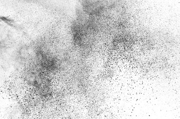 Black particles explosion isolated on white background.  Abstract dust overlay texture.