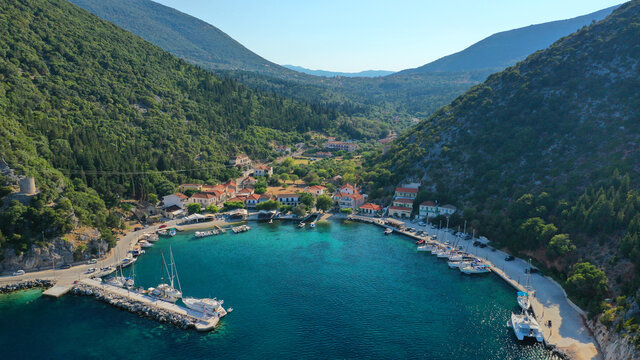 Aerial drone photo of picturesque small fishing village of Frikes a safe anchorage for sail boats and yachts in island of Ithaki or Ithaca, Ionian, Greece