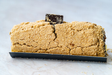 Arctic Cake Milky Roll Dessert with Biscuit Powder and Banana.